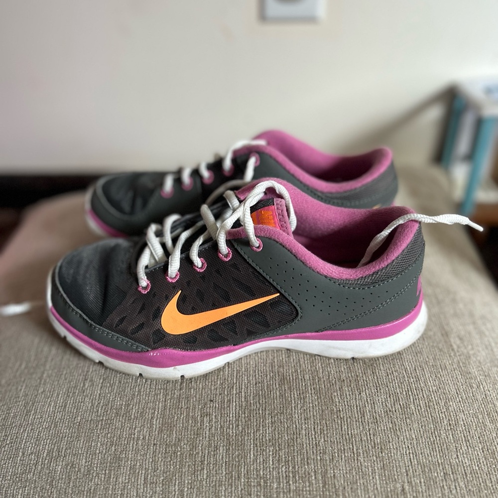 Nike Gray and Pink Athletic Shoes with Sleek Design